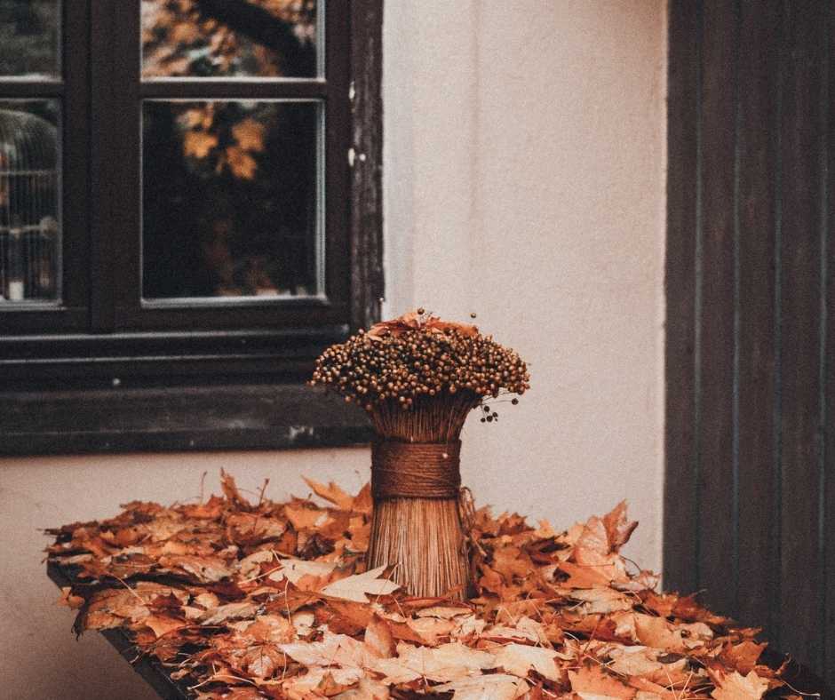 Fall Decorations & Dried Leaves On Table