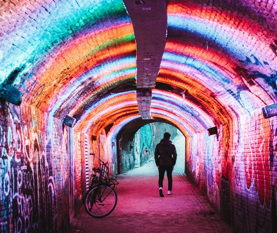 Man & Bike In Colorful Tunnel