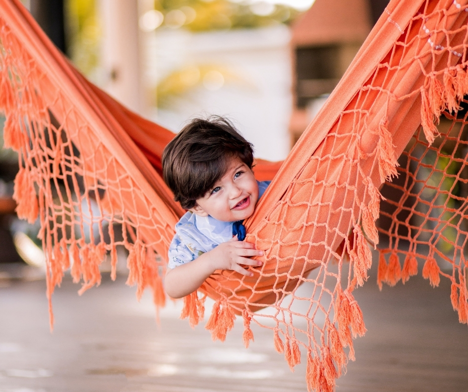 Boy In Orange Hammock