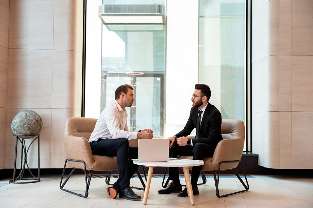 Two Men Having A Discussion