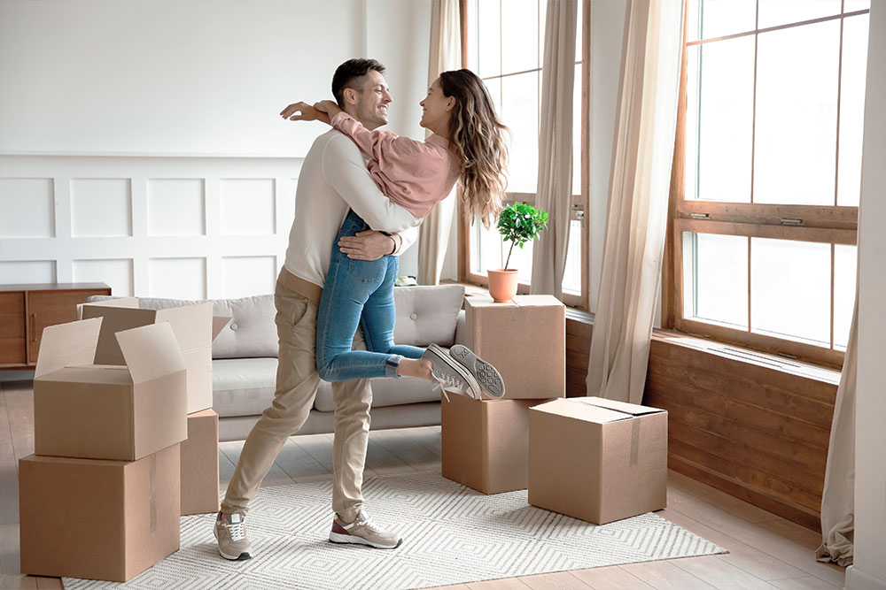Young Couple Excited About Moving Into New Home