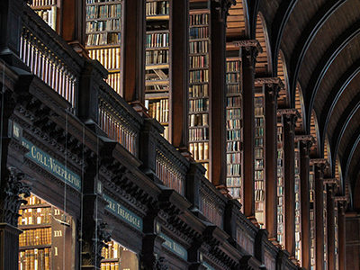 Nighttime Photo Of Library Books, Row After Row