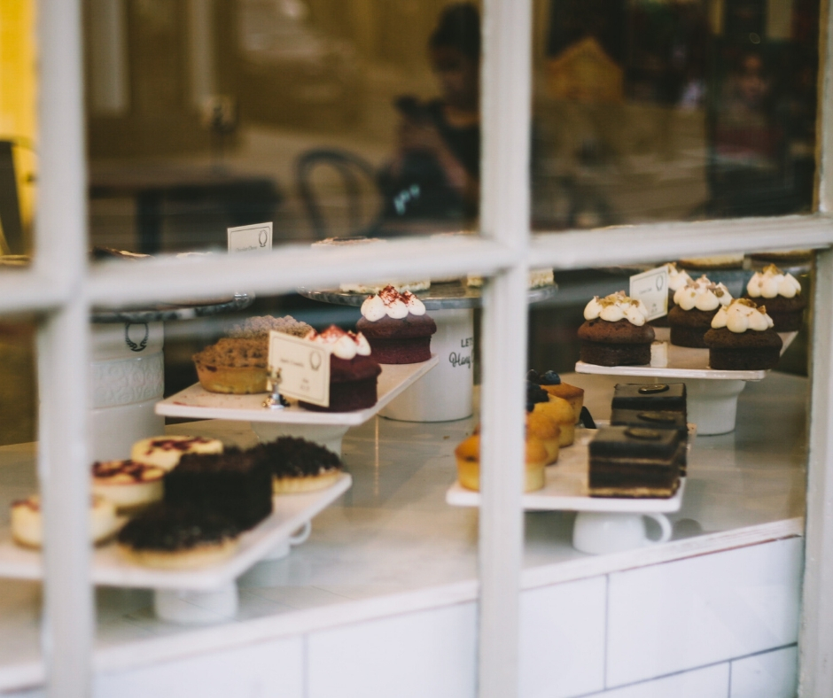 Looking In Window Of Bake Shop