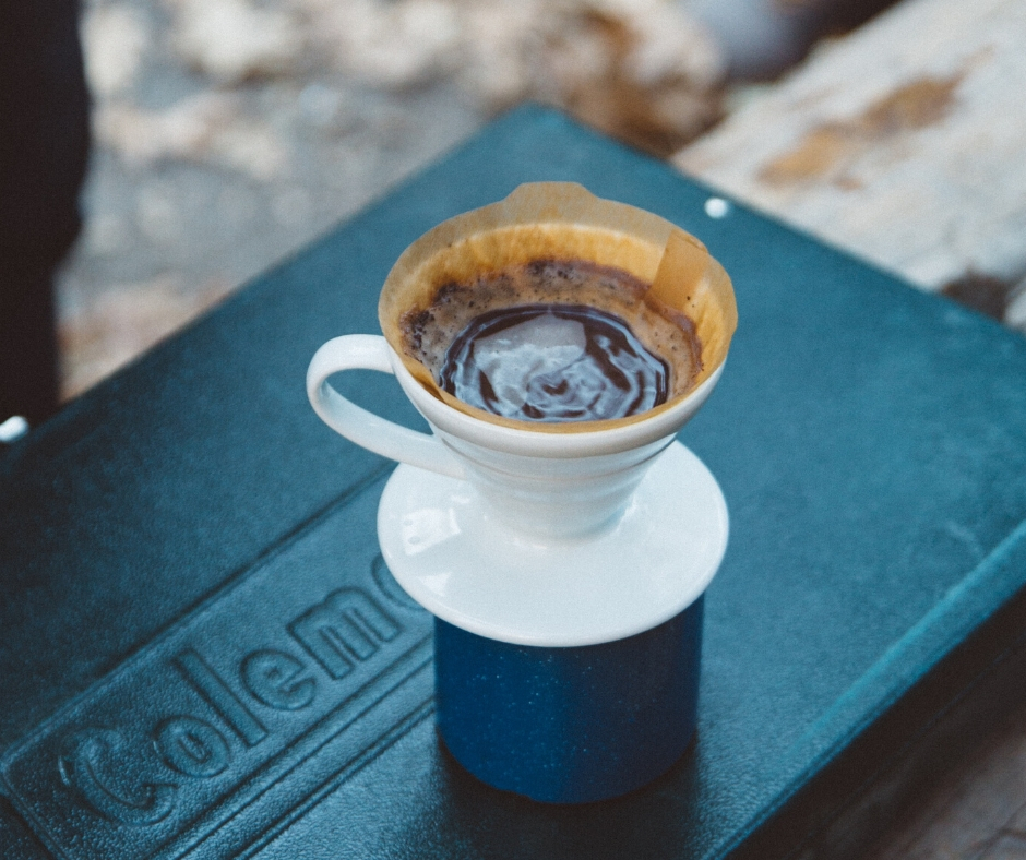 Cup Of Coffee On Coleman Cooler